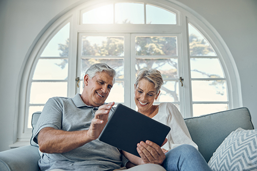 couple looking at ipad