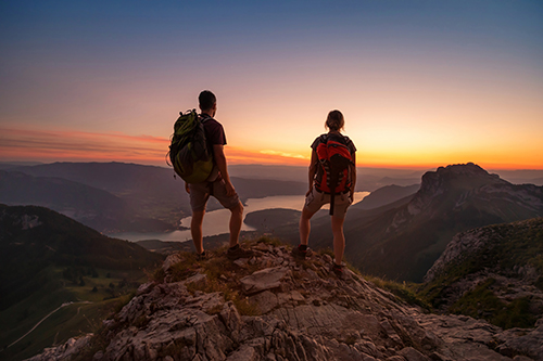 hikers at sunset