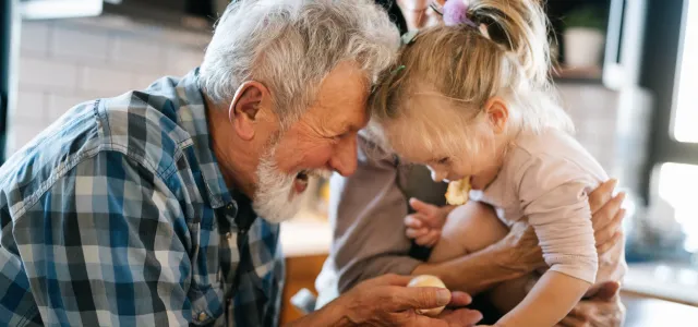 grandparents with granddaughter